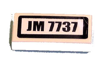 LEGO part Tile 1 x 2 with 'JM 7737' Pattern (Sticker) - Set 7737 (3069pb0106)