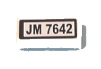 LEGO part Tile 1 x 2 with Black 'JM 7642' Pattern (Sticker) - Set 7642 3069pb0107