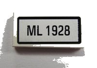 LEGO part Tile 1 x 2 with 'ML 1928' Pattern (Sticker) - Set 10219 3069pb0160