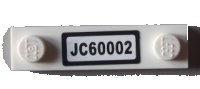 LEGO part Plate, Modified 1 x 4 with 2 Studs without Groove with 'JC60002' Pattern (Sticker) - Set 60002 92593pb010