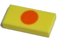 LEGO part Tile 1 x 2 with Orange Circle Pattern 3069pb1003