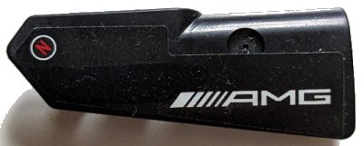 LEGO part Technic, Panel Fairing #22 Very Small Smooth, Side A with White 'AMG' Logo and Red Capital Letter N in Circle Pattern (Sticker) - Set 42165 (11947pb106)