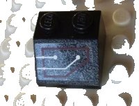 LEGO part Slope 45 2 x 2 with Silver Circuitry, 1 Line Straight, 1 Line Bent in Red Outline Pattern (Sticker) - Set 7702 3039pb053