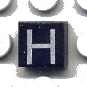 LEGO part Tile 1 x 1 with Silver Capital Letter H Pattern 3070pb016