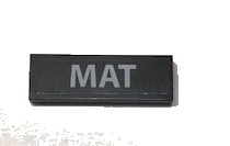 LEGO part Tile 1 x 3 with 'MAT' Pattern (Sticker) - Set 10252 (63864pb062)