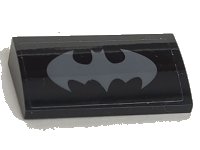 LEGO part Slope, Curved 2 x 4 x 2/3 with Bottom Tubes with Dark Bluish Gray Batman Logo Pattern (Sticker) - Set 70916 88930pb189