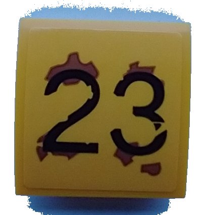 LEGO part Slope, Curved 2 x 2 x 2/3 with Black '23', Medium Nougat Rust Splotches Pattern (Sticker) - Set 70423 (15068pb343)