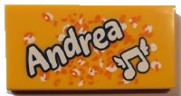 LEGO part Tile 2 x 4 with 'Andrea' and Music Notes with Wings Pattern 87079pb0540