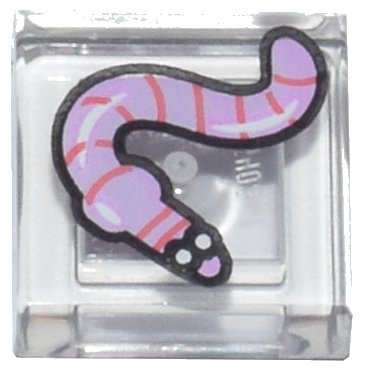 LEGO part Tile 1 x 1 with Bright Pink Worm, Coral Stripes, White Eyes, Black Outline Pattern (3070pb382)