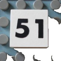 LEGO part Modulex, Tile 2 x 2 (no Internal Supports) with Black Calendar Week Number 51 Pattern Mx1022Apb154