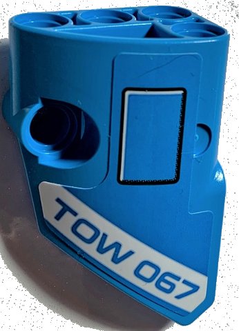LEGO part Technic, Panel Fairing # 2 Small Smooth Short, Side B with 'TOW 067' and Black Outlined Rectangle Pattern (Sticker) - Set 42070 (87086pb070)
