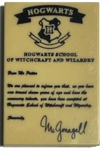 LEGO part Tile 2 x 3 with 'HOGWARTS' Acceptance Pattern 26603pb048