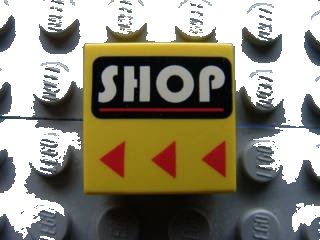 LEGO onderdeel Tile 2 x 2 with White 'SHOP' and Red Line on Black Rounded Rectangle, Red Triangles Pattern (3068px29)