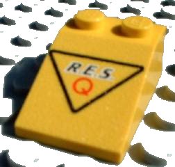 LEGO part Slope 33 3 x 2 with Black 'R.E.S.' and Red 'Q' in Black Triangle Pattern (3298pb024)