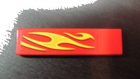 LEGO part Tile 1 x 4 with Yellow Flames Pattern Model Front Left Side (Sticker) - Set 8667 2431pb0124L
