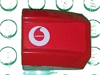 LEGO onderdeel Slope, Curved 2 x 2 Lip with Vodafone Pattern Left (Sticker) - Sets 8654 / 8375 (30602pb032L)
