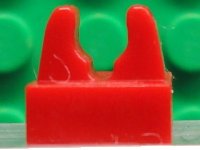 LEGO part Tile, Modified 1 x 1 with Clip with Center Cut 93794