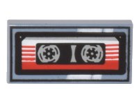 LEGO part Tile 1 x 2 with Cassette Tape with Red and White Striped Label and Black Frame Pattern 3069pb1104