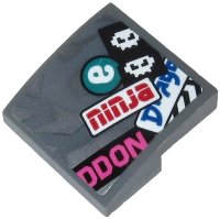LEGO part Slope, Curved 2 x 2 x 2/3 with Red 'ninja', Dark Pink 'DDON', Blue 'Drago', White 'e' and White Faces Pattern (Sticker) - Set 71710 15068pb231