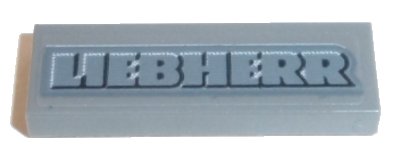 LEGO part Tile 1 x 3 with Light Bluish Gray 'LIEBHERR' Pattern (Sticker) - Set 42100 (63864pb160)