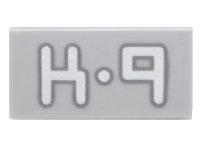 LEGO part Tile 1 x 2 with 'K-9' Pattern 3069pb0425