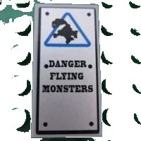 LEGO part Tile 2 x 4 with 'DANGER FLYING MONSTERS' and Blue Triangle Pattern (Sticker) - Set 8190 87079pb0043