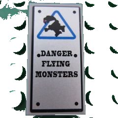 LEGO onderdeel Tile 2 x 4 with 'DANGER FLYING MONSTERS' and Blue Triangle Pattern (Sticker) - Set 8190 (87079pb0043)