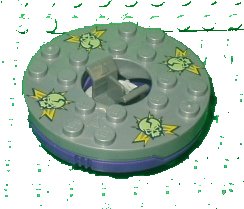 LEGO onderdeel Turntable 6 x 6 x 1 1/3 Round Base with Flat Silver Top and Glow In Dark Skulls on Yellow Pattern (Ninjago Spinner) (92549c07pb01)