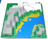 LEGO part Baseplate, Raised 32 x 32 Canyon with Blue and Yellow Stream Pattern 6024px2