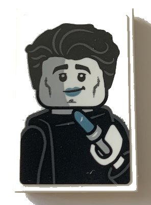 LEGO part Tile 2 x 3 with Black and White Minifigure, Metallic Light Blue Lipstick Pattern (Sticker) - Set 21319 (26603pb075)