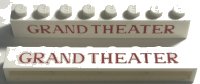 LEGO part Brick 1 x 8 without Bottom Tubes with Cross Side Supports with Red 'GRAND THEATER' Thin Pattern crssprt01pb009