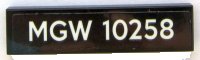 LEGO part Tile 1 x 4 with White 'MGW 10258' on Black Background Pattern (Sticker) - Set 10258 2431pb0571