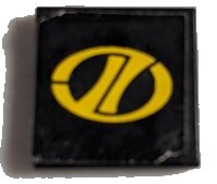 LEGO part Tile 2 x 2 with Yellow Stylized 'LT' on Oval Racing Logo Pattern (Sticker) - Set 8880 (3068pb1418)