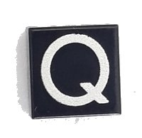 LEGO part Tile 1 x 1 with Silver Capital Letter Q Pattern - Larger Font and Parallelogram Line 3070pb025b