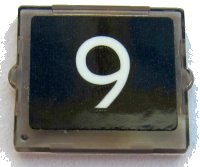 LEGO part Glass for Window 1 x 2 x 2 Flat Front with White Number 9 on Black Background Pattern (Sticker) - Set 10258 60601pb019