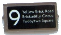 LEGO part Glass for Window 1 x 2 x 3 with '9', 'Yellow Brick Road', 'Brickadilly Circus' and 'Twobytwo Square' Pattern (Sticker) - Set 10258 60602pb10