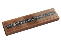 LEGO part Tile 1 x 4 with White 'SIR ALEX FERGUSON STAND' on Medium Nougat Background Pattern (Sticker) - Set 10272 2431pb0670