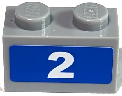 LEGO part Brick 1 x 2 with White Number 2 on Blue Background Pattern (Sticker) - Set 7641 (3004pb079)
