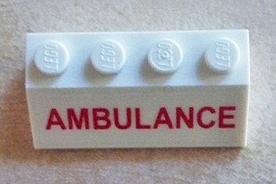 LEGO part Schräge 45 2 x 4 mit Red 'AMBULANCE' Pattern (Aufkleber) - Set 60023 (3037pb027)