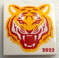 LEGO part Tile 2 x 2 with Bright Light Orange and Red Tiger Head and '2022' Pattern (BAM) 3068pb1891