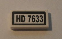 LEGO part Carreau 1 x 2 with Black 'HD 7633' on White Background Pattern (Sticker) - Set 7633 (3069pb0129)