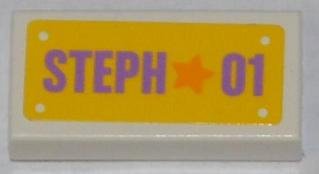 LEGO part Piastrella 1 x 2 with Orange Star and Medium Lavender 'STEPH 01' on Yellow Background Pattern (Adesivo) - Set 3183 (3069pb0272)
