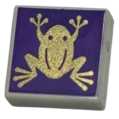 LEGO part Tile 1 x 1 with Gold Frog on Dark Purple Background Pattern (HP Chocolate Frog) (3070pb301)