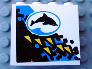 LEGO part Panel 1 x 4 x 3 with Oval and Dolphin Facing Right Pattern (Sticker) - Set 6556 (4215pb022)