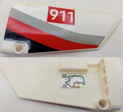 LEGO part Technic, Panel Fairing #18 Large Smooth, Side B with White '911' on Red Rectangle and Gray, Red and Black Curved Stripes Pattern (Sticker) - Set 42096 (64682pb031)