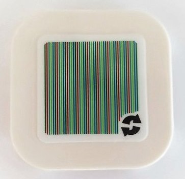 LEGO part Tile, Modified 4 x 4 with Rounded Corners and 4 Feet with Super Mario Scanner Code 2 Arrows Cycle Pattern (Sticker) - Set 71389 (68869pb009)