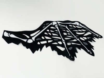 LEGO part Cloth Wing Dragon Right, Tattered with Bones, Black Skin, and Dark Bluish Gray Spots Pattern (69658)