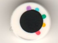 LEGO part Tile, Round 1 x 1 with Black Circle Eye with Medium Lavender, Medium Azure, Dark Turquoise, Yellow, and Coral Eyelashes Pattern 98138pb202