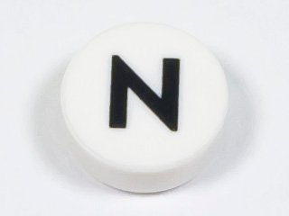 LEGO part Tile, Round 1 x 1 with Black Capital Letter N Pattern (98138pb224)