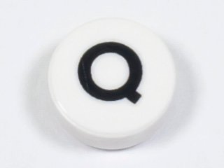LEGO part Tile, Round 1 x 1 with Black Capital Letter Q Pattern (98138pb227)